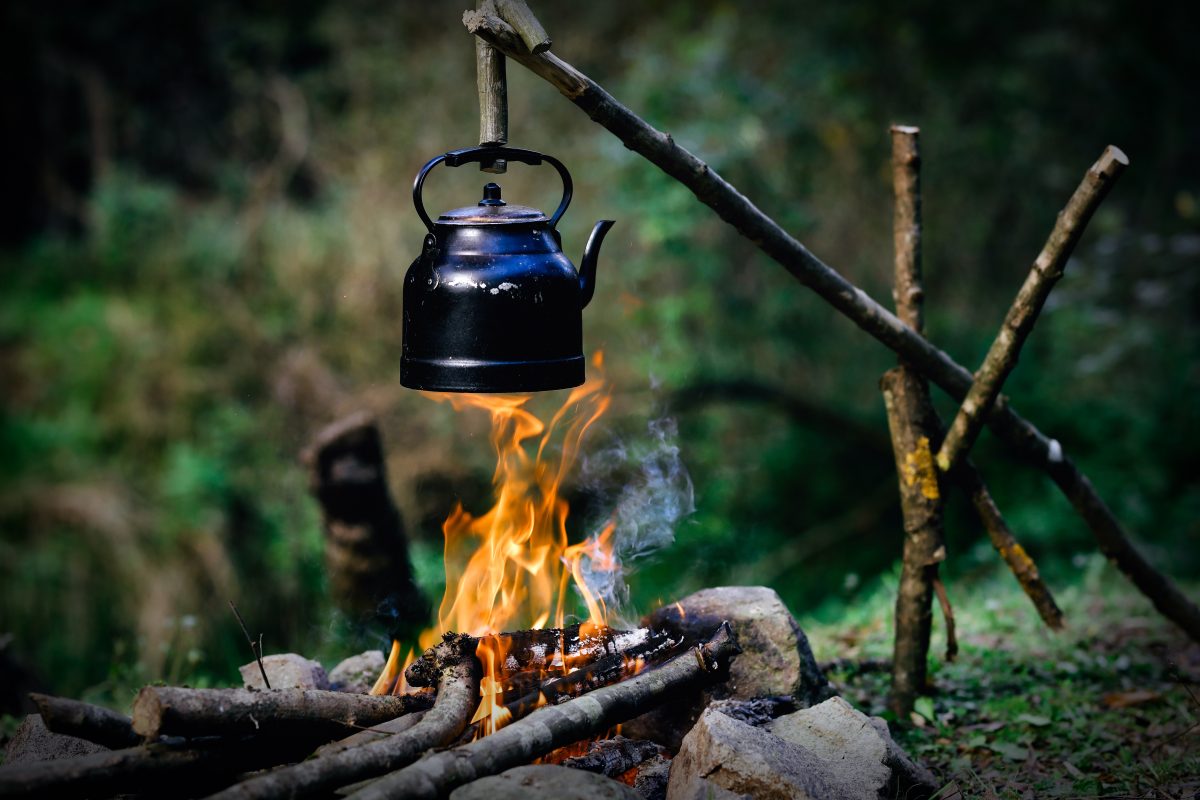 Teapot over campfire
